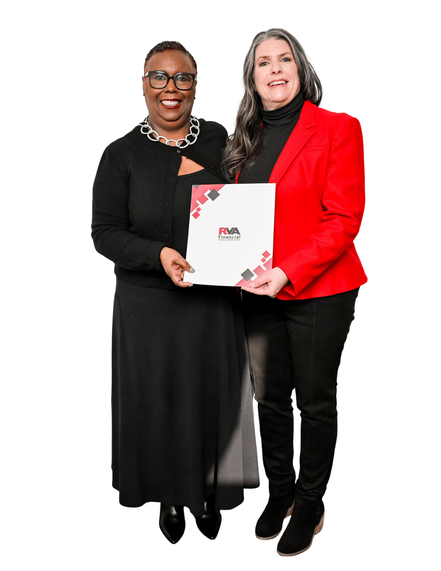 Two women stand side by side smiling. One wears a black outfit and glasses, the other wears a red blazer and holds a folder with an “RVA” logo. The background is white.